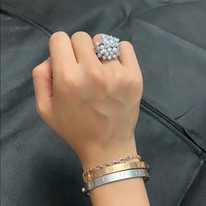 Silver Star cluster ring. It moves!